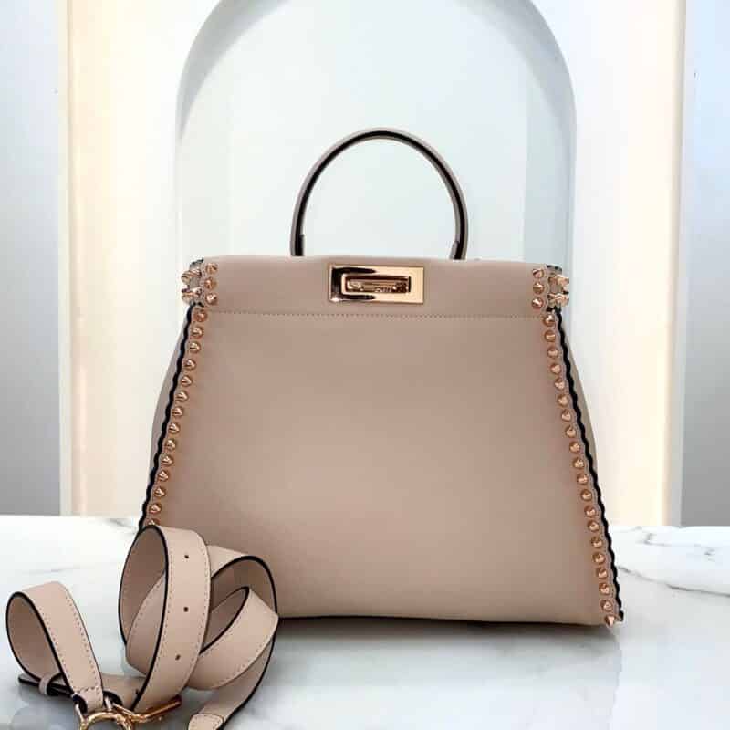 FENDI芬迪波浪边缘电镀尖钉五金装饰手提袋9109M