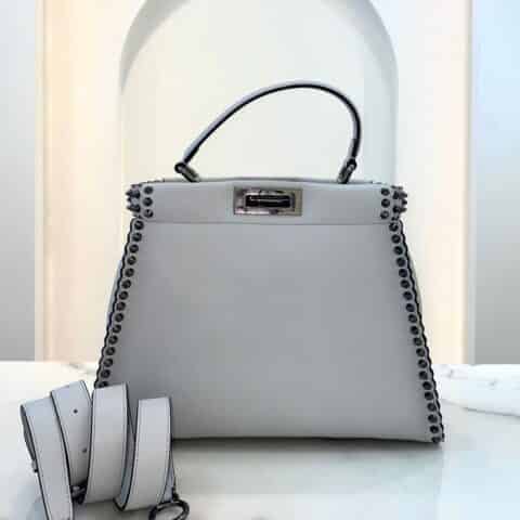 FENDI芬迪波浪边缘电镀尖钉五金装饰手提袋9109M