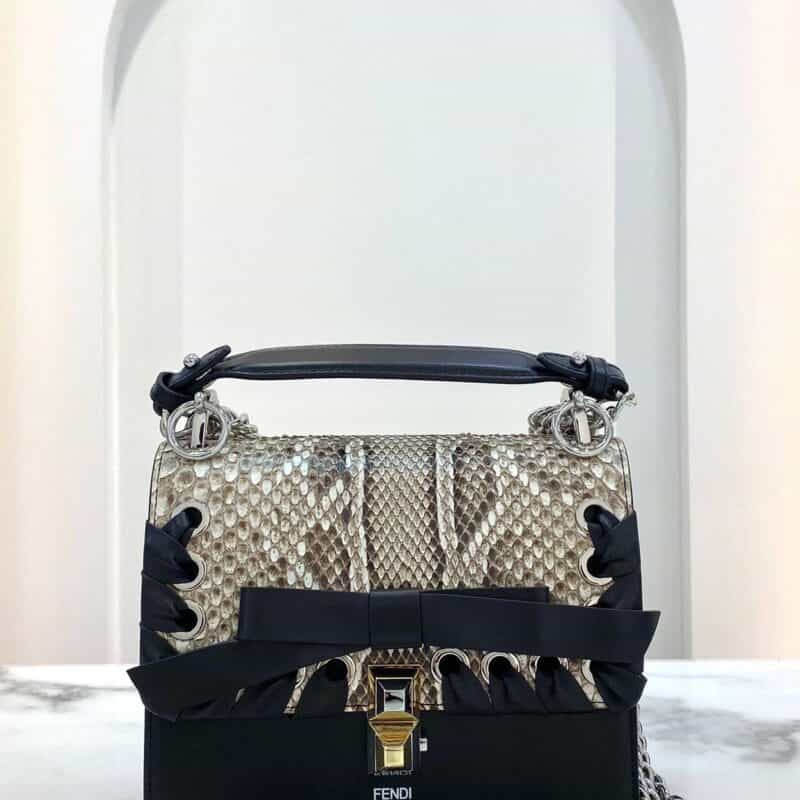 FENDI芬迪盖头蛇皮穿孔编织蝴蝶结肩背包643