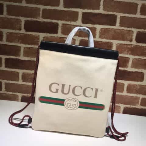 GUCCI古驰黄色柔软皮革抽绳背包523586