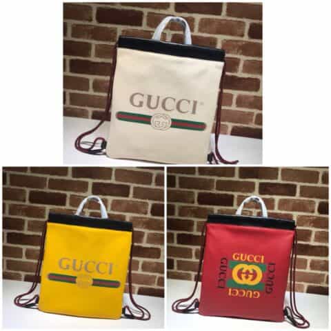 GUCCI古驰黄色柔软皮革抽绳背包523586