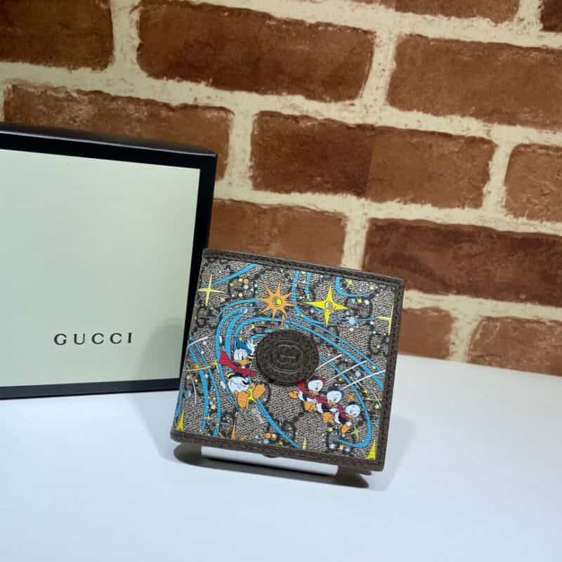 GUCCI古驰Disney x Gucci唐老鸭印花双折钱包647937