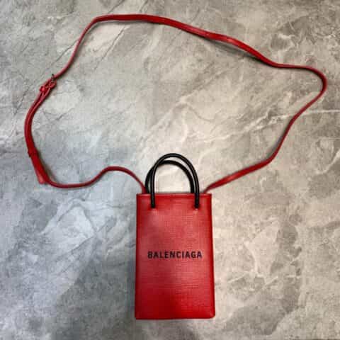 Balenciaga巴黎世家配牛皮肩带迷你手机包