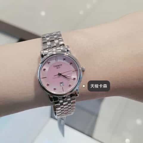 天梭 新款卡森臻我简约粉贝母表盘砖石刻度石英钢带女表T122系列瑞士ETA进口机芯