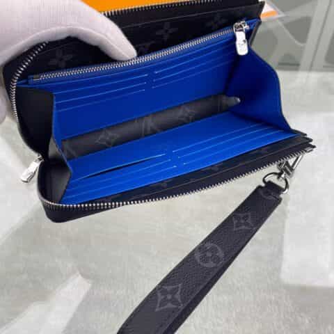 Louis Vuitton LV 小硬箱漫画图案Zippy Dragonne手拿包 M80994