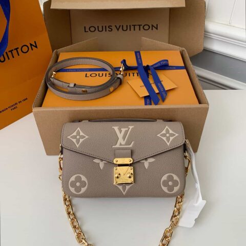 LV M23081 Pochette Métis East West
