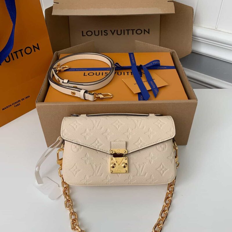LV M22942 Pochette Métis East West